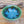 Load image into Gallery viewer, Wheel-thrown bowl with blue glazed interior and greenish brown accents on rim_alt view
