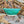 Load image into Gallery viewer, Wheel thrown bowl with cream interior and celadon glaze and muted chatter texture on exterior_side view
