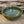 Load image into Gallery viewer, Wheel thrown carved bowl has a blue celadon glaze with additional blue-green accents

