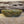Load image into Gallery viewer, Wheel thrown bowl has a blue celadon glaze with additional blue-green accents
