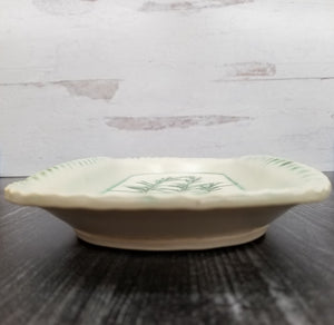 Ceramic serving tray with rosemary texture inlay and green accents