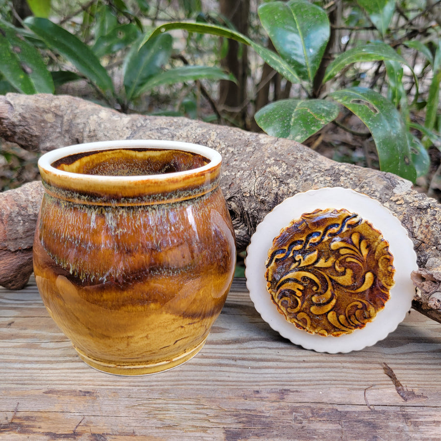 Lidded jar with amber celadon glaze and texture on lid_underside lid detail