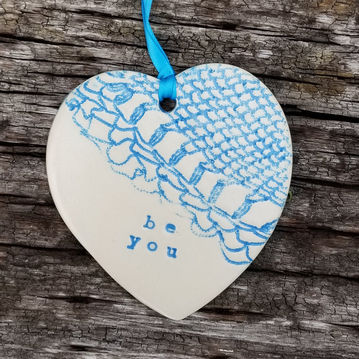 Turquoise heart shaped pendant with lace texture and inspirational message. (matte finish)