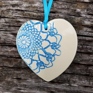 Turquoise heart shaped pendant with lace texture. (gloss finish)