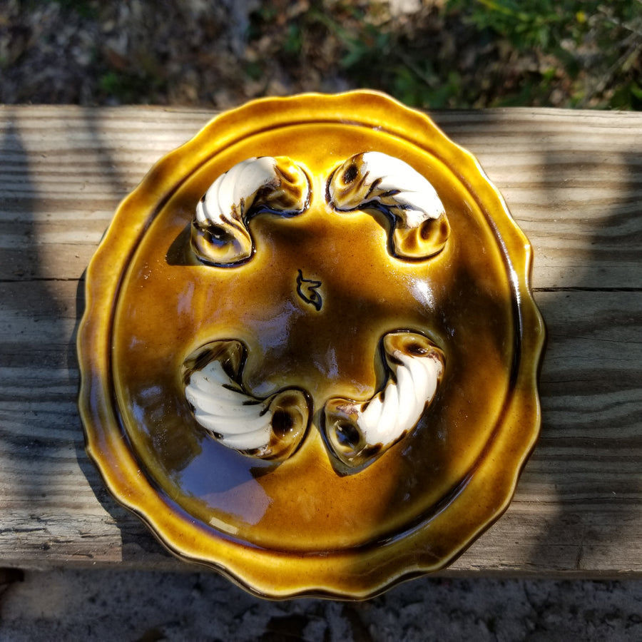 Soap dish glazed with amber glaze with soft black brushstrokes_back view.