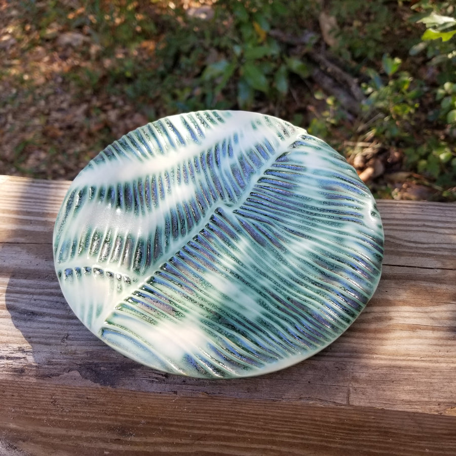 Leaf textured green & cream colored soap dish.